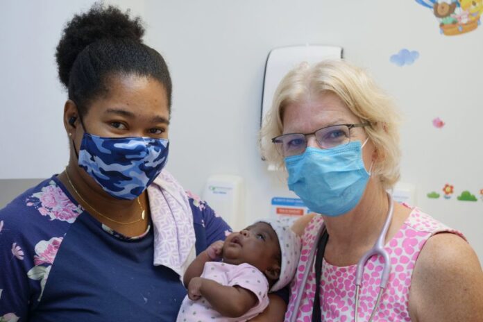 Dr Sara Watkin, Neonatologist, with Baby Renae and Mum